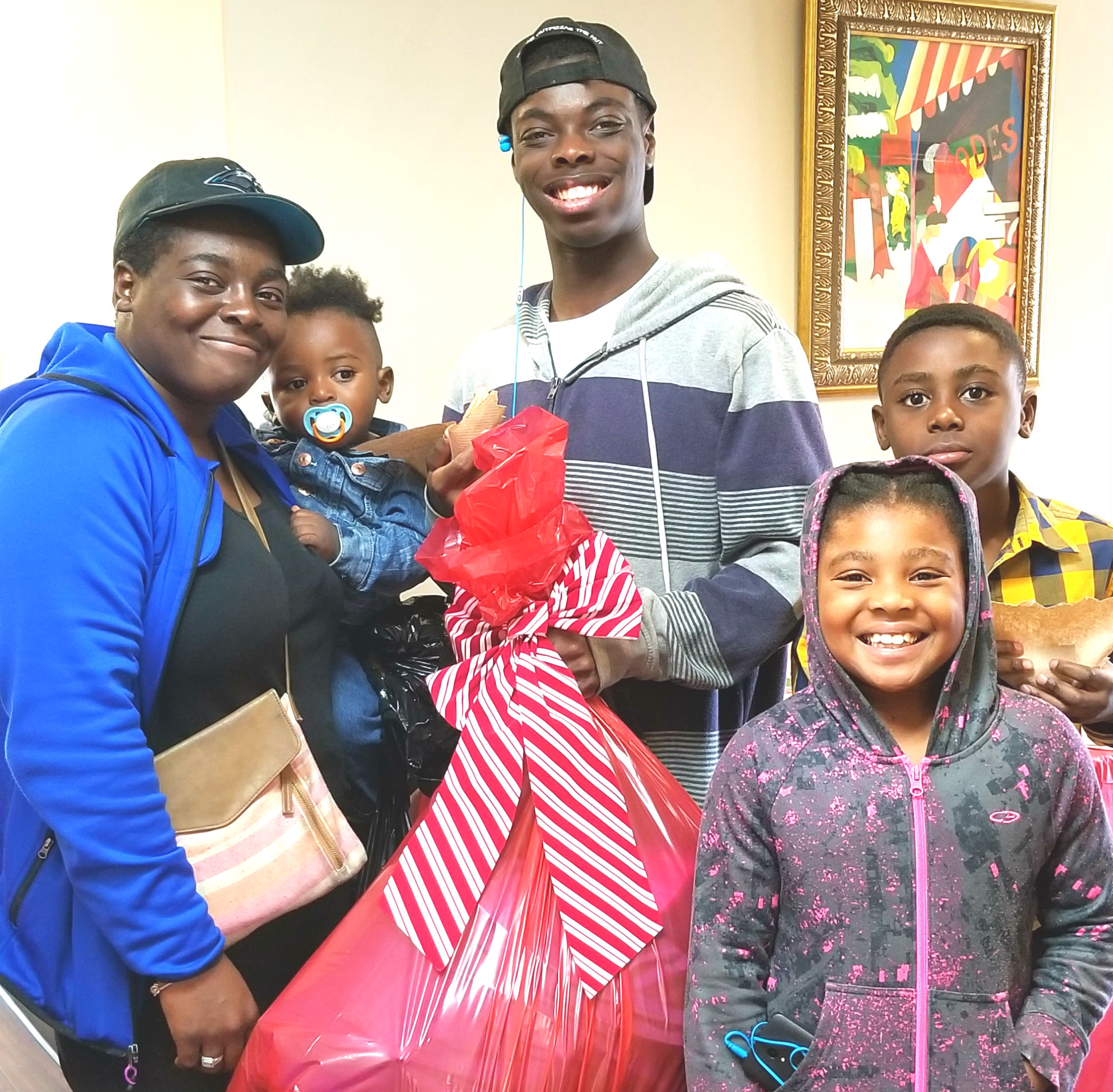 One family receives their holiday package.